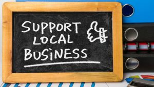 Collaborate with local businesses and promote sustainable tourism