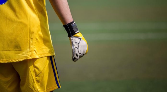 achieving defensive greatness with goalkeeper gloves