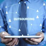 What is outsourcing and how does it work