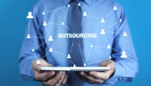 What is outsourcing and how does it work