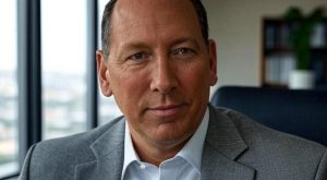 What Companies And Sectors Has John Textor Invested In